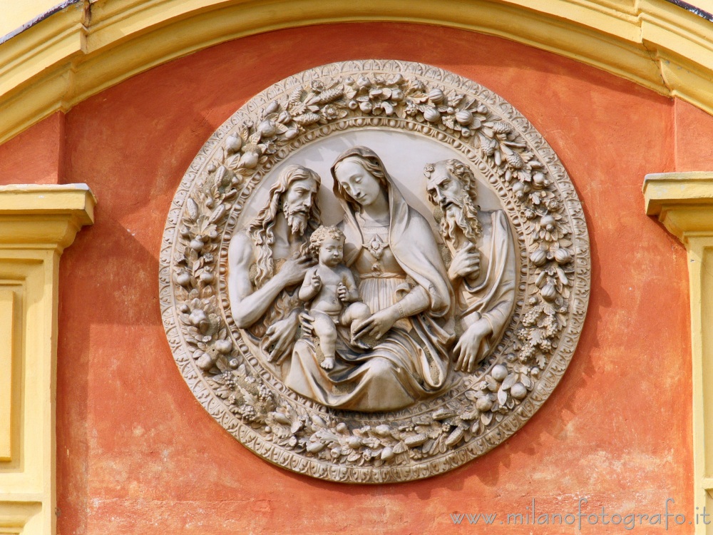 Magnano (Biella, Italy) - Round above the main entrance to the parish church of the Saints Baptist and Secondus